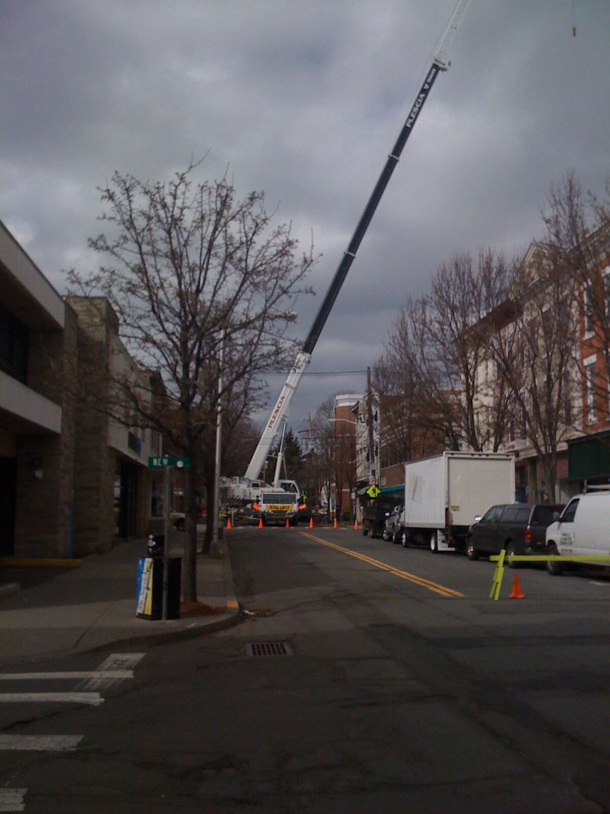 sobwaycrane A crane, several stories tall, climbs into the sky above So Broadway on 3/30/09